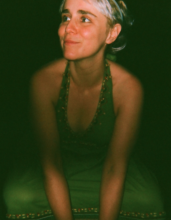 photo of erica dreisbach in a green dress