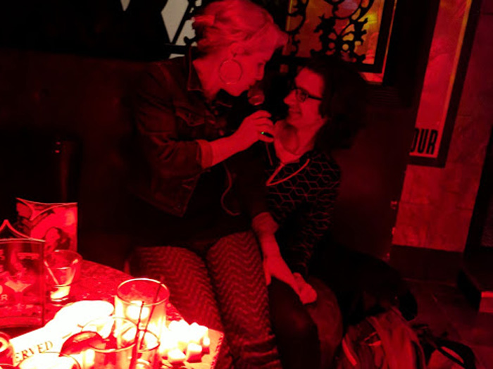 erica flirting with Vlad at karaoke | photo by Nat